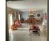 Spacious living room with tile floors, stylish furnishings, and ample natural light at 306 Park St, Saint George, SC 29477