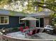 Backyard patio featuring a dining set and grill, perfect for outdoor entertaining at 306 Park St, Saint George, SC 29477