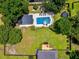 Breathtaking aerial view of a private backyard oasis with a sparkling pool at 309 Pinopolis Park Dr, Moncks Corner, SC 29461