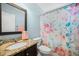 Bathroom featuring a decorative shower curtain and granite countertops at 309 Pinopolis Park Dr, Moncks Corner, SC 29461