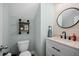 Modern half bathroom with vanity, granite counters, and decor shelving at 309 Pinopolis Park Dr, Moncks Corner, SC 29461