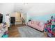 Charming bedroom featuring a cozy pink sofa and blue and white walls at 309 Pinopolis Park Dr, Moncks Corner, SC 29461