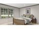 Tranquil bedroom with a wooden bed frame, soft green accents, and ample natural light at 313 Marion Rd, Dorchester, SC 29437