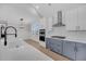 Bright, modern kitchen with a large island, stainless steel appliances, and custom cabinetry at 3170 Vanessa Lynne Ln, Johns Island, SC 29455