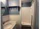 Bathroom boasting a marble countertop sink, complemented by a tiled shower and blue accent wall at 352 Oxford Rd, Ladson, SC 29456