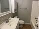 Tiled bathroom featuring a tub and vanity with decorative backsplash at 352 Oxford Rd, Ladson, SC 29456