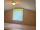 Carpeted room with a window and neutral colored walls at 352 Oxford Rd, Ladson, SC 29456