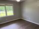 Bedroom featuring hardwood floors and natural light from the window at 352 Oxford Rd, Ladson, SC 29456