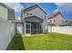 Backyard featuring fenced in yard and screened-in patio, ideal for outdoor living at 3903 Poplar Grove Pl, Summerville, SC 29483