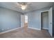 Bedroom featuring blue painted walls, neutral carpet and a ceiling fan at 3903 Poplar Grove Pl, Summerville, SC 29483