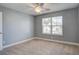 Bright bedroom with a ceiling fan and a window providing natural light at 3903 Poplar Grove Pl, Summerville, SC 29483