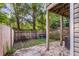 Backyard with partially covered patio, and privacy fence at 4030 Babbitt St, Charleston, SC 29414