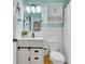 Updated bathroom with wainscoting, a vanity, and a toilet at 4030 Babbitt St, Charleston, SC 29414