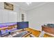 Office with hardwood floors, closet, and wooden desk with two monitors at 4030 Babbitt St, Charleston, SC 29414