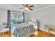 Bedroom features natural light, hardwood floors and neutral paint at 4030 Babbitt St, Charleston, SC 29414
