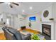 Spacious living room with hardwood floors, a fireplace, and an open layout for modern living and entertaining at 4030 Babbitt St, Charleston, SC 29414