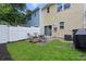 Private backyard with patio and comfortable seating area perfect for relaxation at 412 Grand Palm Ln, Summerville, SC 29485