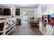 Cozy dining area adjacent to kitchen featuring an eat-in bar and stylish décor at 412 Grand Palm Ln, Summerville, SC 29485