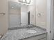Bathroom vanity featuring granite counters and white cabinets at 4140 Home Town Ln, Ravenel, SC 29470