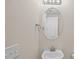 A small bathroom with a mirror, sink and faucet, and a towel rack at 4140 Home Town Ln, Ravenel, SC 29470