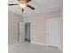 This is a bedroom with a ceiling fan and white doors at 4140 Home Town Ln, Ravenel, SC 29470