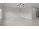 A spacious bedroom with tile flooring and a ceiling fan at 4140 Home Town Ln, Ravenel, SC 29470