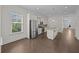 A kitchen featuring stainless steel appliances, granite countertops, and an island at 4140 Home Town Ln, Ravenel, SC 29470