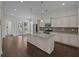 Open-concept kitchen featuring granite countertops, stainless steel appliances, and an island with seating at 4140 Home Town Ln, Ravenel, SC 29470