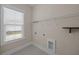 Laundry room with connections, wire shelving, and a window at 4140 Home Town Ln, Ravenel, SC 29470