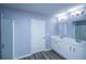 Full bathroom featuring double sinks, white cabinets, and brushed nickel fixtures at 431 Buckhannon Ln, Moncks Corner, SC 29461