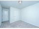 Bright bedroom with neutral carpet, white doors and trim and a large closet for storage at 431 Buckhannon Ln, Moncks Corner, SC 29461