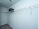 Spacious walk-in closet with custom shelving offering ample storage space and a personal safe at 431 Buckhannon Ln, Moncks Corner, SC 29461