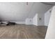 Spacious attic with wood-style flooring and ample storage, perfect for extra space and organization at 439 Temple Rd, Ladson, SC 29456