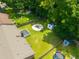Aerial view of the home's backyard, complete with shed, trampoline, and a cozy fire pit area for entertaining at 439 Temple Rd, Ladson, SC 29456