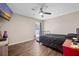 Modern bedroom with ample space, wood-style flooring, and a large window for natural light at 439 Temple Rd, Ladson, SC 29456