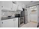 Modern kitchen featuring stainless steel appliances and a convenient pantry at 439 Temple Rd, Ladson, SC 29456