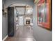 Inviting living space featuring a cozy fireplace, arched entryway, and stylish decor at 439 Temple Rd, Ladson, SC 29456