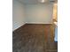 Expansive living room featuring sleek, modern flooring and neutral walls, perfect for any decor style at 4669 Palm View Cir, North Charleston, SC 29418