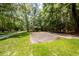 Community basketball court surrounded by trees, offering a recreational space in a serene environment at 477 Commonwealth Rd, Mount Pleasant, SC 29466