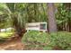 Welcoming Commonwealth community sign surrounded by lush greenery, creating a sense of natural beauty at 477 Commonwealth Rd, Mount Pleasant, SC 29466