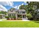 Charming two-story home with a welcoming front porch and well-maintained landscaping at 477 Commonwealth Rd, Mount Pleasant, SC 29466