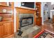 Close up of the fireplace with custom wood mantel and built-in shelving on either side at 477 Commonwealth Rd, Mount Pleasant, SC 29466
