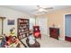 This cozy living room features a ceiling fan, carpet, and traditional-style furniture at 477 Commonwealth Rd, Mount Pleasant, SC 29466