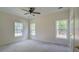 Bedroom with natural light from the windows and a ceiling fan at 480 Longleaf Dr, Walterboro, SC 29488
