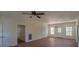 Spacious living room with hardwood floors, recessed lights, and several doors at 480 Longleaf Dr, Walterboro, SC 29488