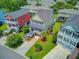 Charming two-story home boasts well-manicured lawn, lush landscaping, and inviting stairways in a vibrant neighborhood at 492 Sanders Farm Ln, Wando, SC 29492