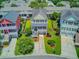 Inviting two-story home with manicured lawn, fenced backyard, and vibrant colors in a friendly neighborhood at 492 Sanders Farm Ln, Wando, SC 29492