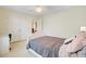 Cozy bedroom with a comfortable bed, large closet, and soft lighting for a relaxing atmosphere at 492 Sanders Farm Ln, Wando, SC 29492