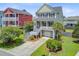 Beautiful two-story home with a ground-level garage, well-manicured lawn, and desirable curb appeal at 492 Sanders Farm Ln, Wando, SC 29492