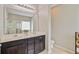 Bright main bathroom features double sink vanity, tile floors, and glass enclosed shower at 492 Sanders Farm Ln, Wando, SC 29492